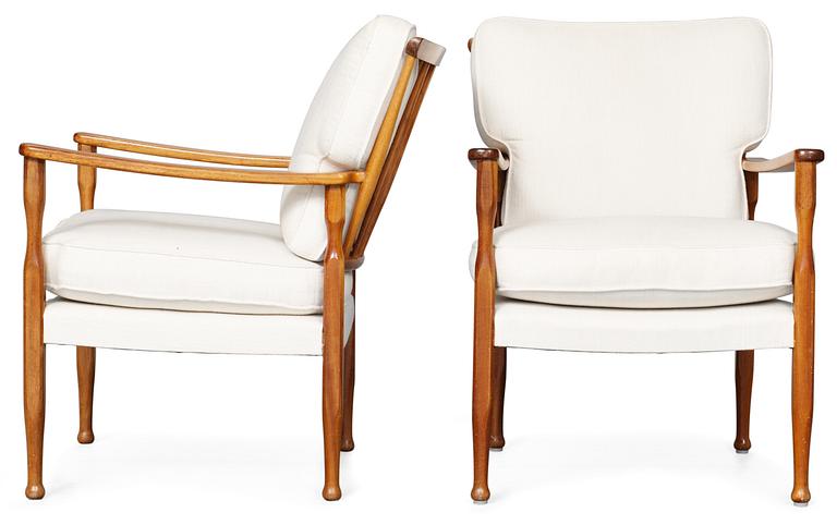 A pair of Josef Frank mahogany easy chairs, Firma Svenskt Tenn.