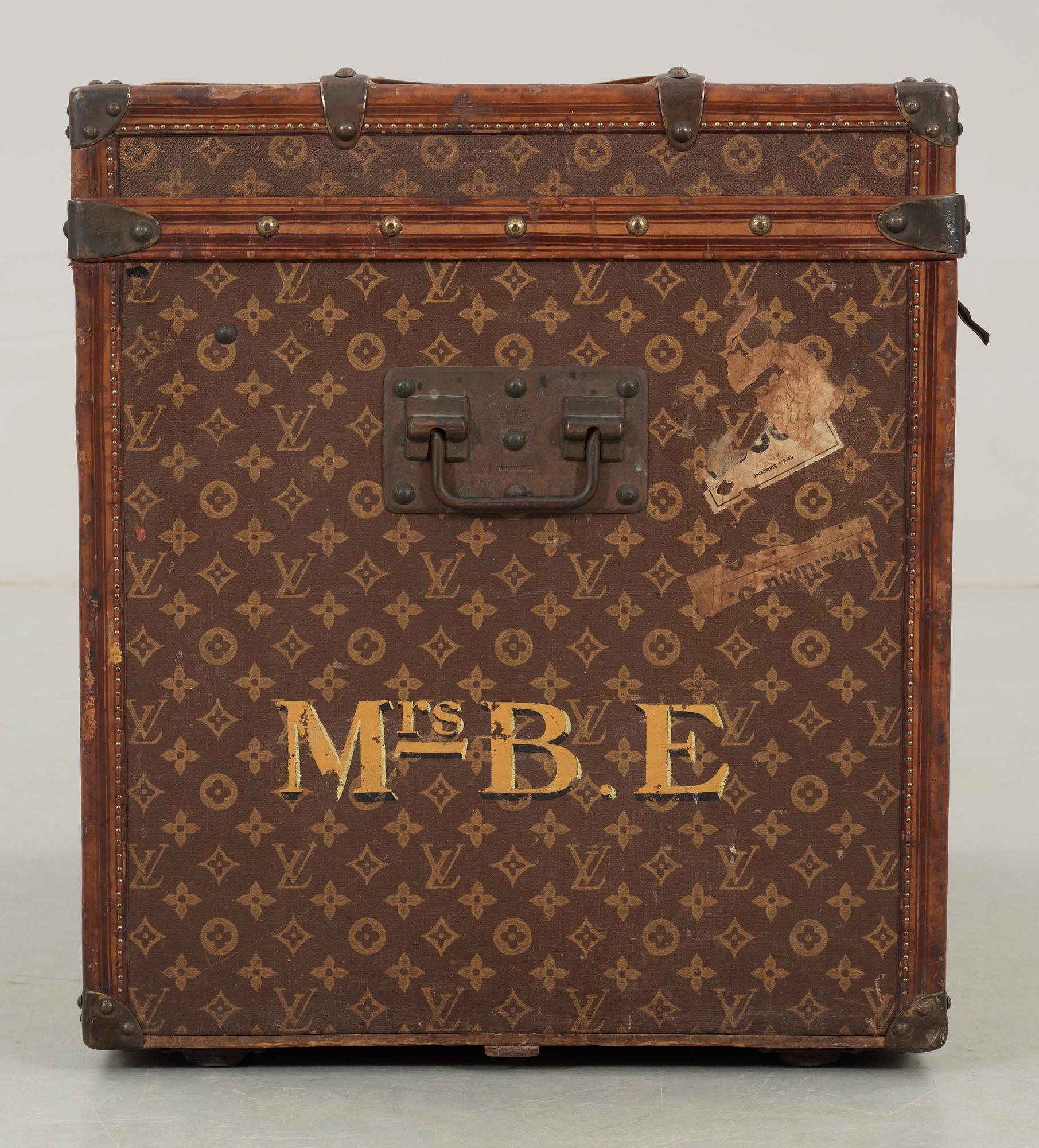 An early 20th cent monogram canvas trunk by Louis Vuitton.