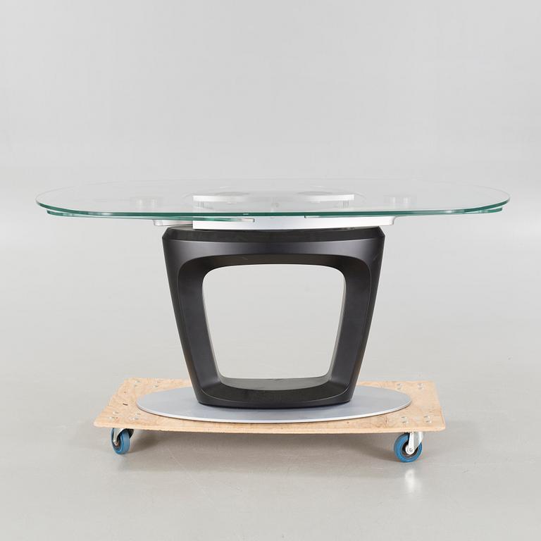 A 21st century "Orbital" dinner table by Pininfarina for Calligaris.