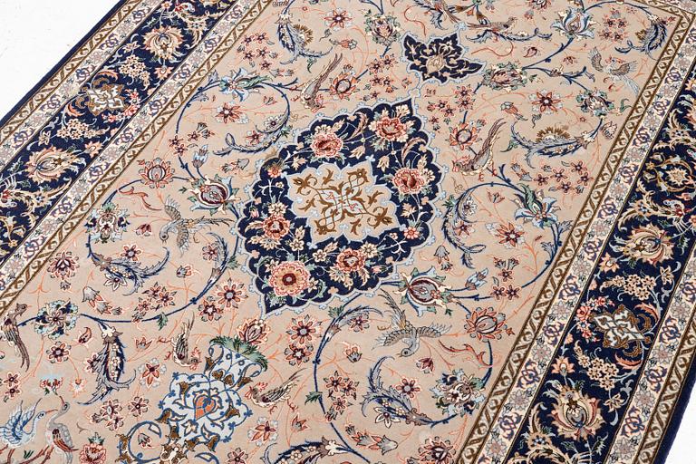 An Isfahan rug, c. 220 x 145 cm.