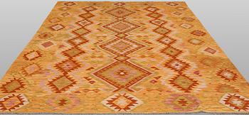 A Kelim carpet, 295 x 201 cm.