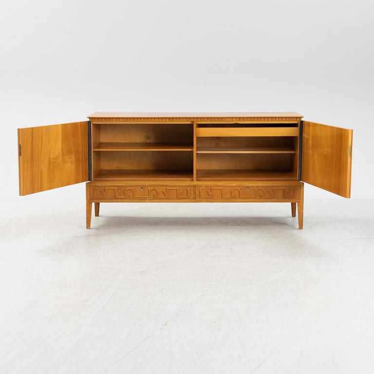 A Swedish Modern elmwood veneered sideboard, 1940's.