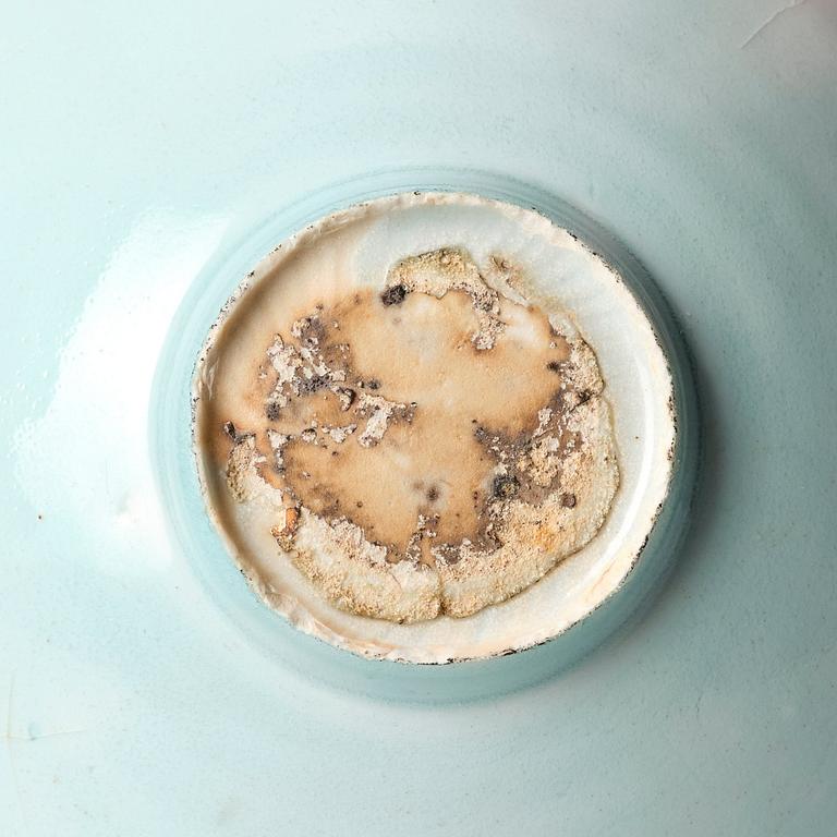 A carved qingbai 'boys' bowl, Song dynasty (960-1279).