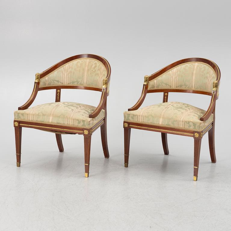 A sofa, two armchairs, four chairs and table, Empire style, 20th century.