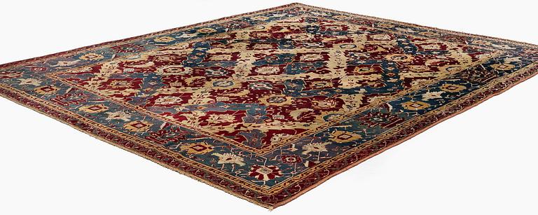 An Antique Agra carpet of 'Dragon Lattice' design, North India, 375 x 298 cm.