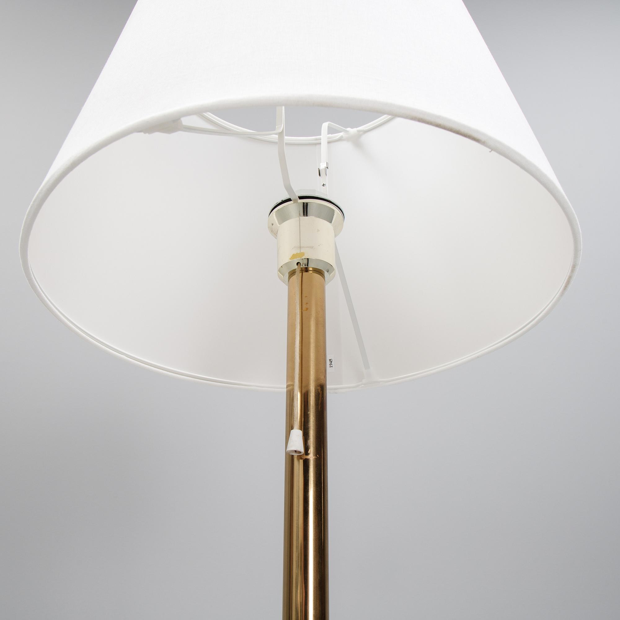 Bergboms, a pair of model 'G-024' brass floor lamps. Second half of the 20th century.