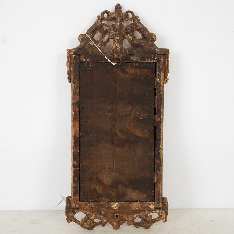 A Swedish rococo giltwood mirror, Stockholm, later part 18th century.