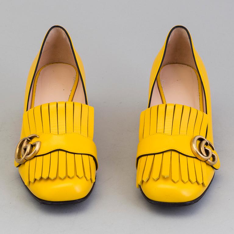 A pair of Loafers by Gucci, in size 39.