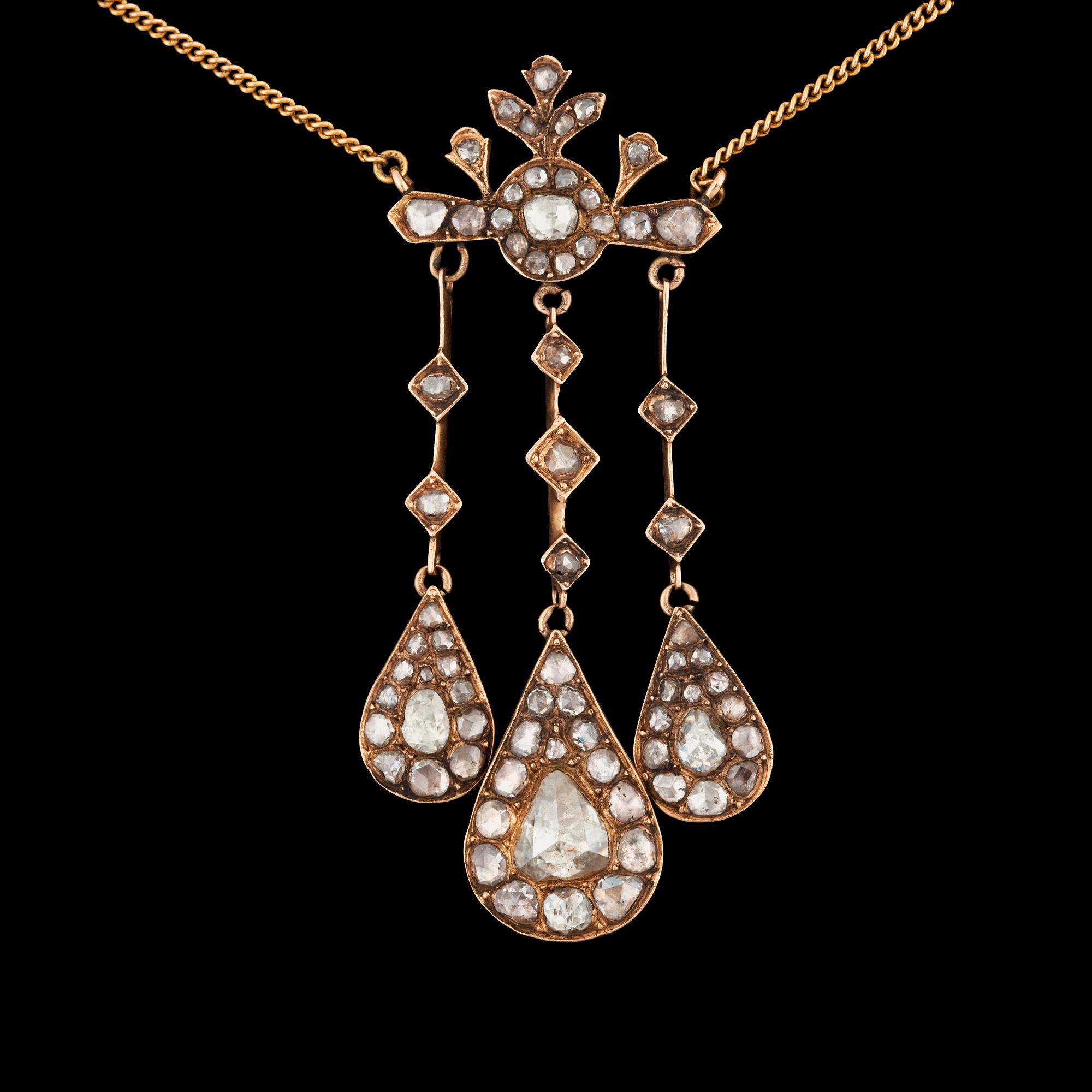 A rose cut diamond pendant.