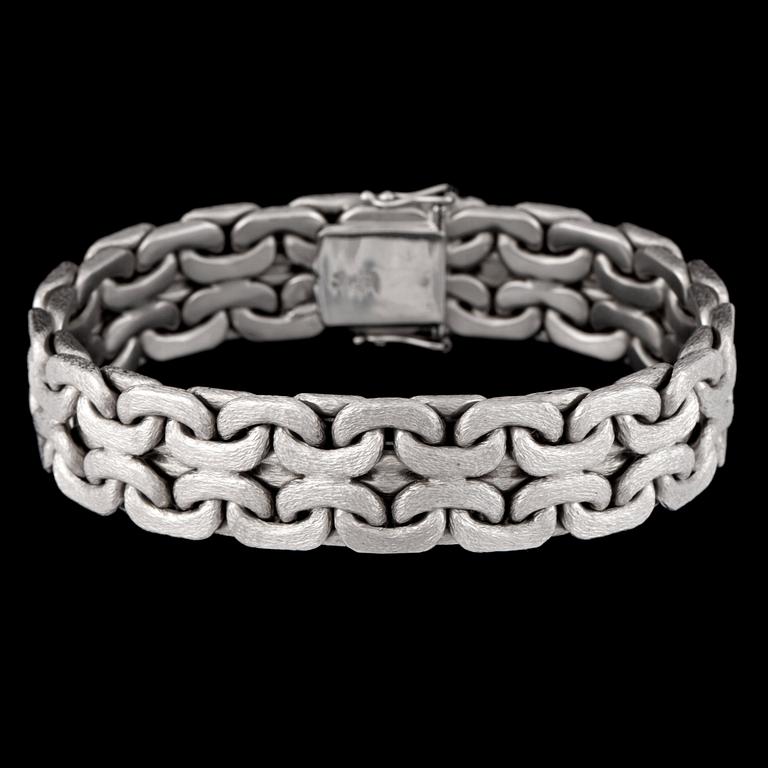 A white gold bracelet.
