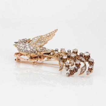 BROSCH, "Paradisfågel" med gammal- samt rosenslipade diamanter, safirer och rubiner.