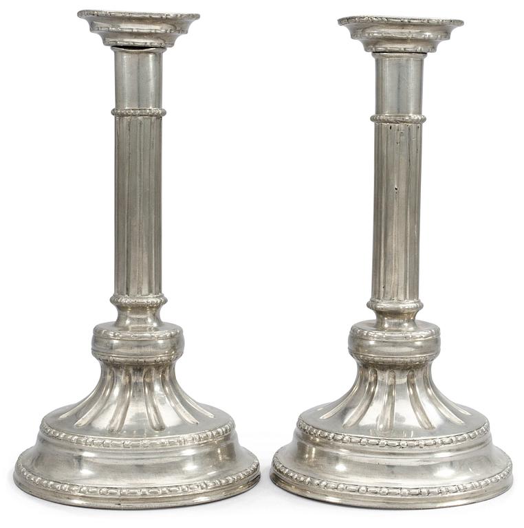 A pair of pewter candlesticks by S. Weigang 1785.