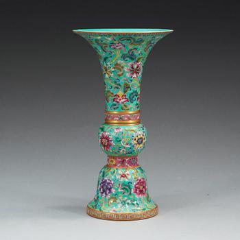 A famille rose against turquoise ground vase, 20th Century, with Qianlong mark.