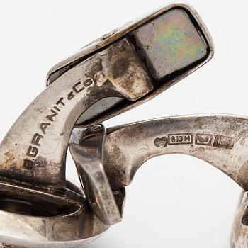 Erik Granit, manschettknappar, 2 par, silver, tigeröga, rökkvarts. Helsingfors 1964.