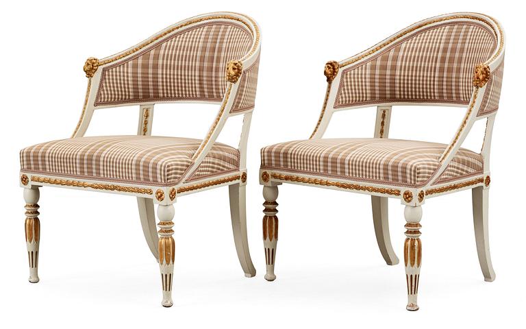 A pair of late Gustavian early 19th century armchairs.