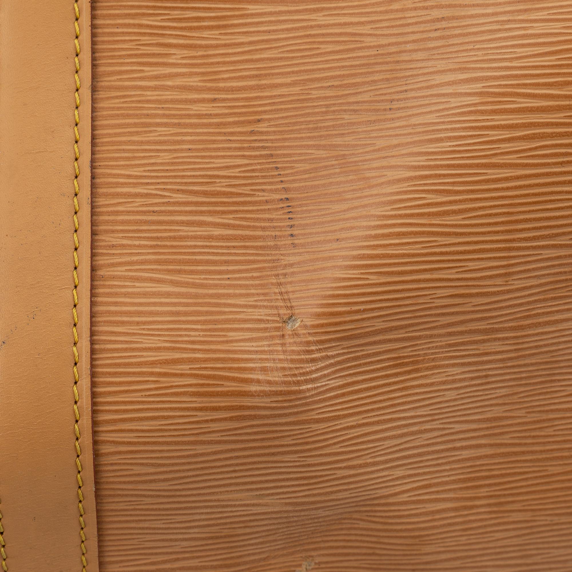 Louis Vuitton, am Epi 'Keepall 50' weekend bag.