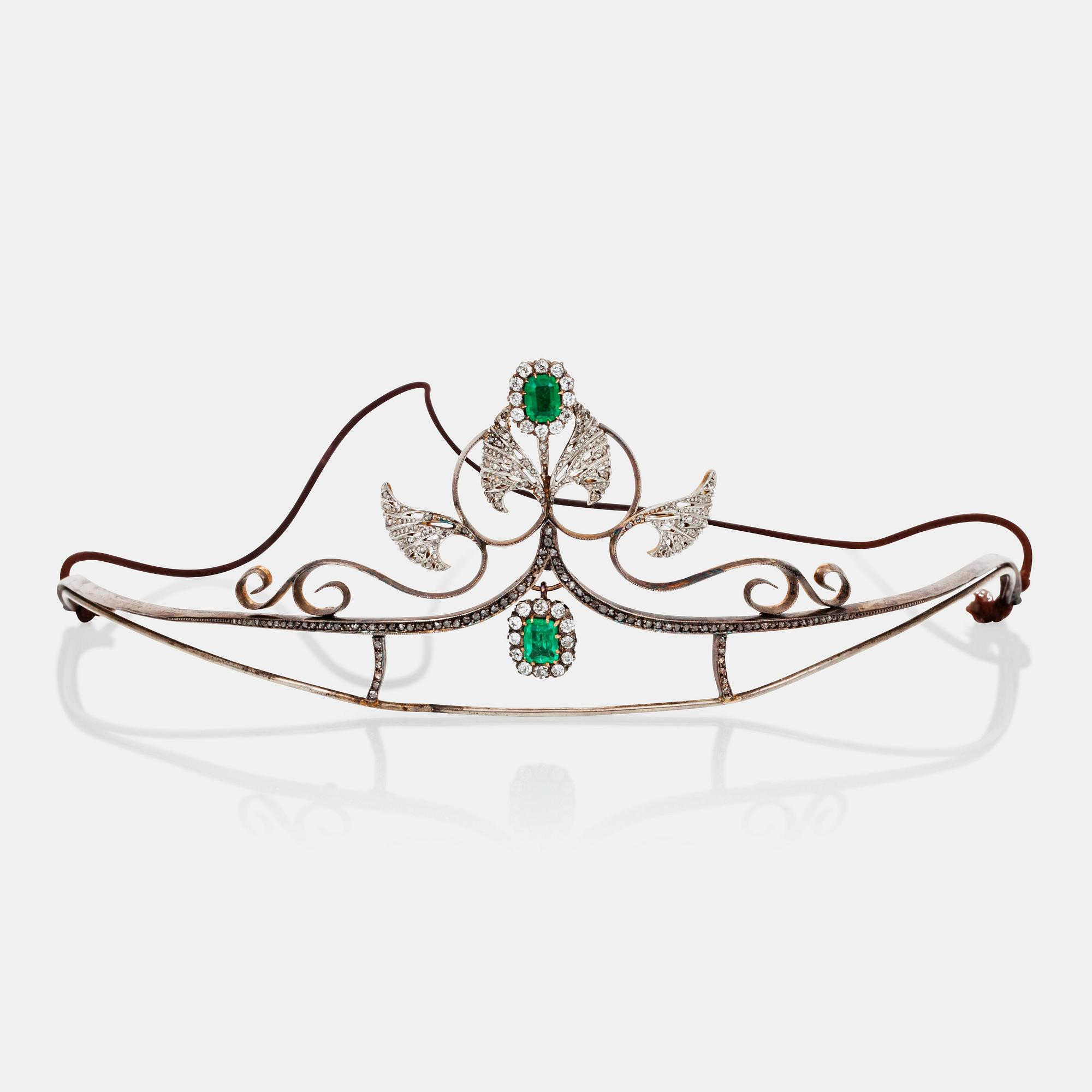 An Art Noveau emerald, old- and rose- cut diamond tiara. Circa 1910.