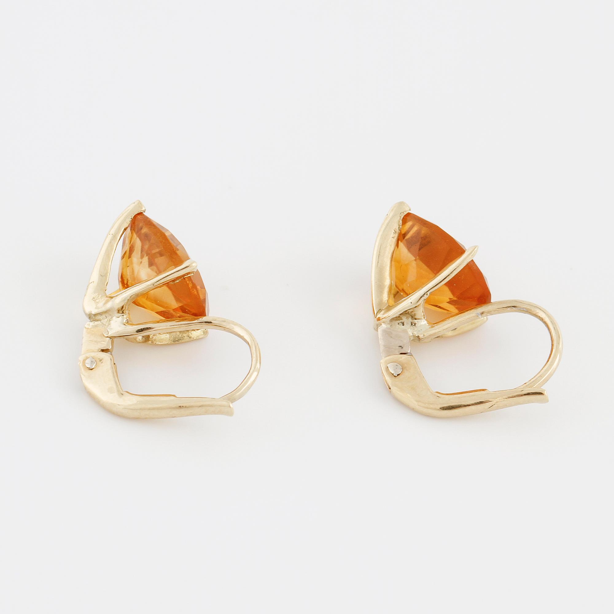 A pair of citrine earrings.