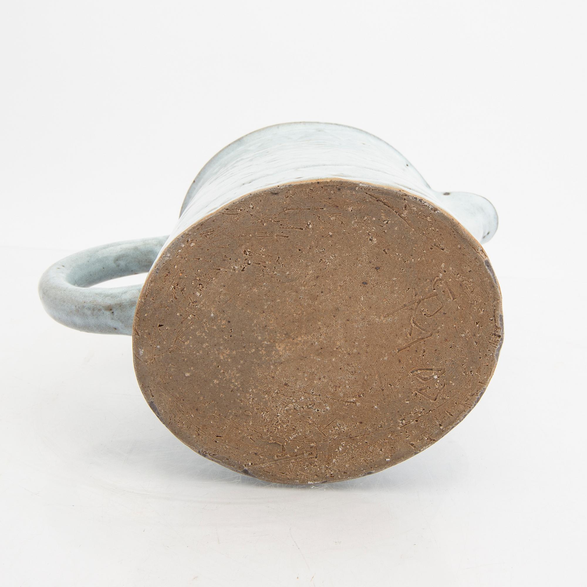 Signe Persson-Melin, a glazed ceramic pitcher, signed by hand.
