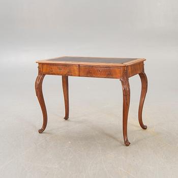 A Neo Rococo walnut desk later part of the 20th century.