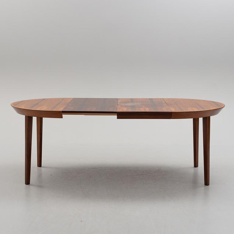 A 1950s/1960s rosewood veneer table.