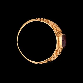 RINGAR, 2 st, 18k guld med karneol och ametist. En möjl Johan Wahlström, Jönköping, 1850. Tot vikt 10g.