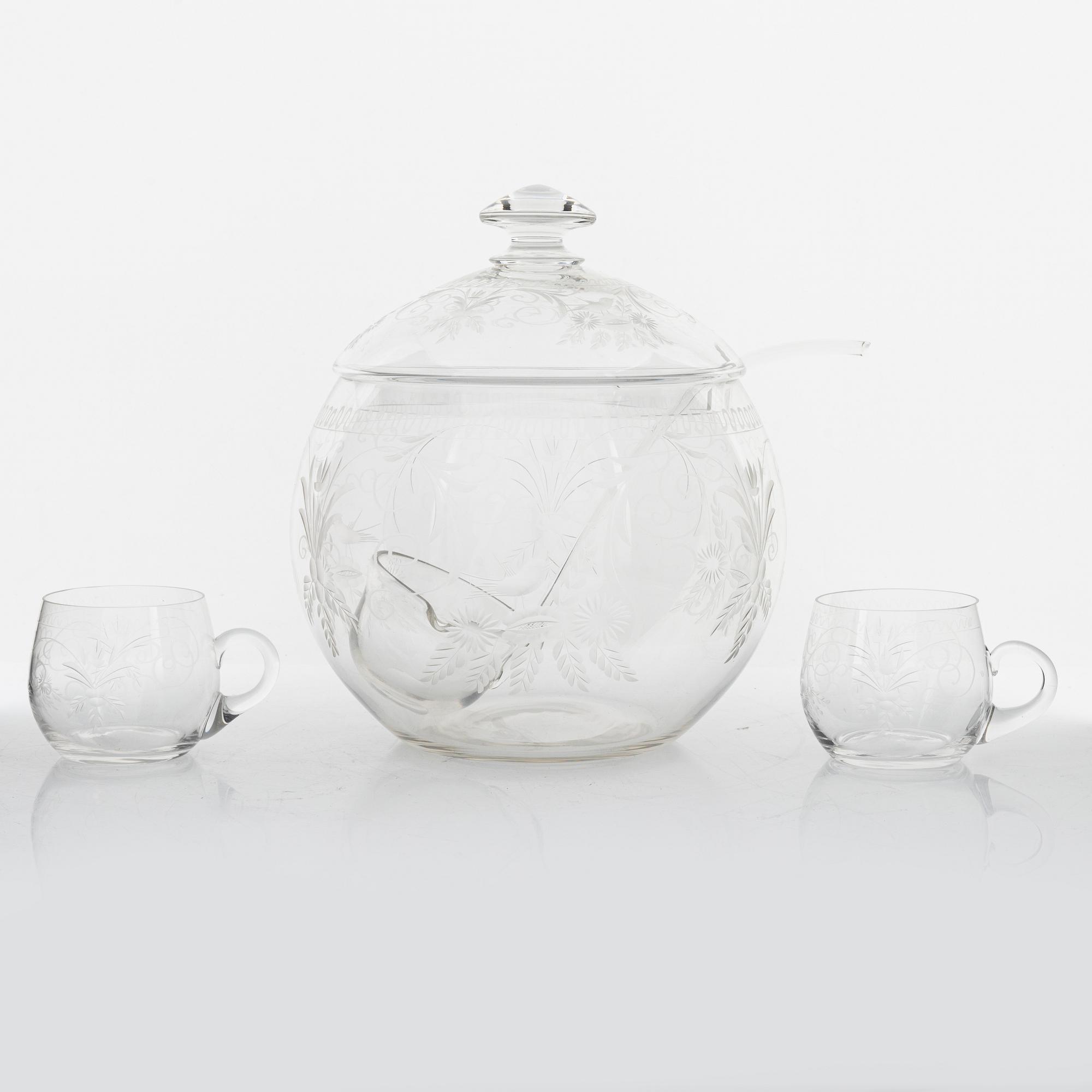 A punch bowl and mugs, glass, mid 20th century.