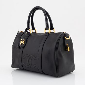 Chanel, a black caviar leather 'Boston bag'.