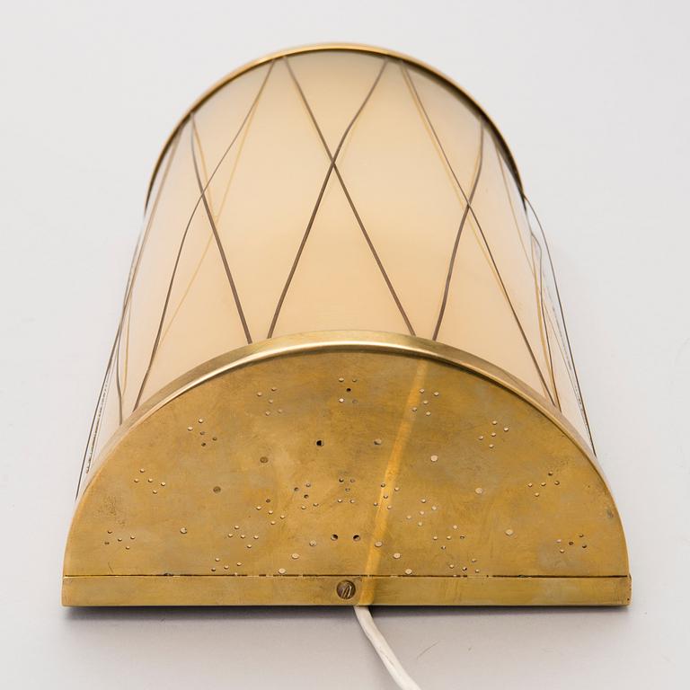 A mid 20th century '3061' wall light for Stockmann Orno, Finland.