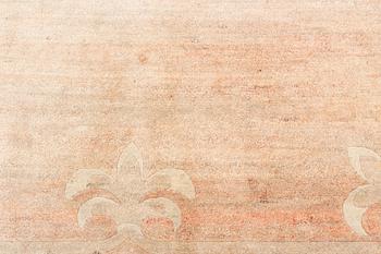A Chinese carpet, c. 330 x 270 cm.