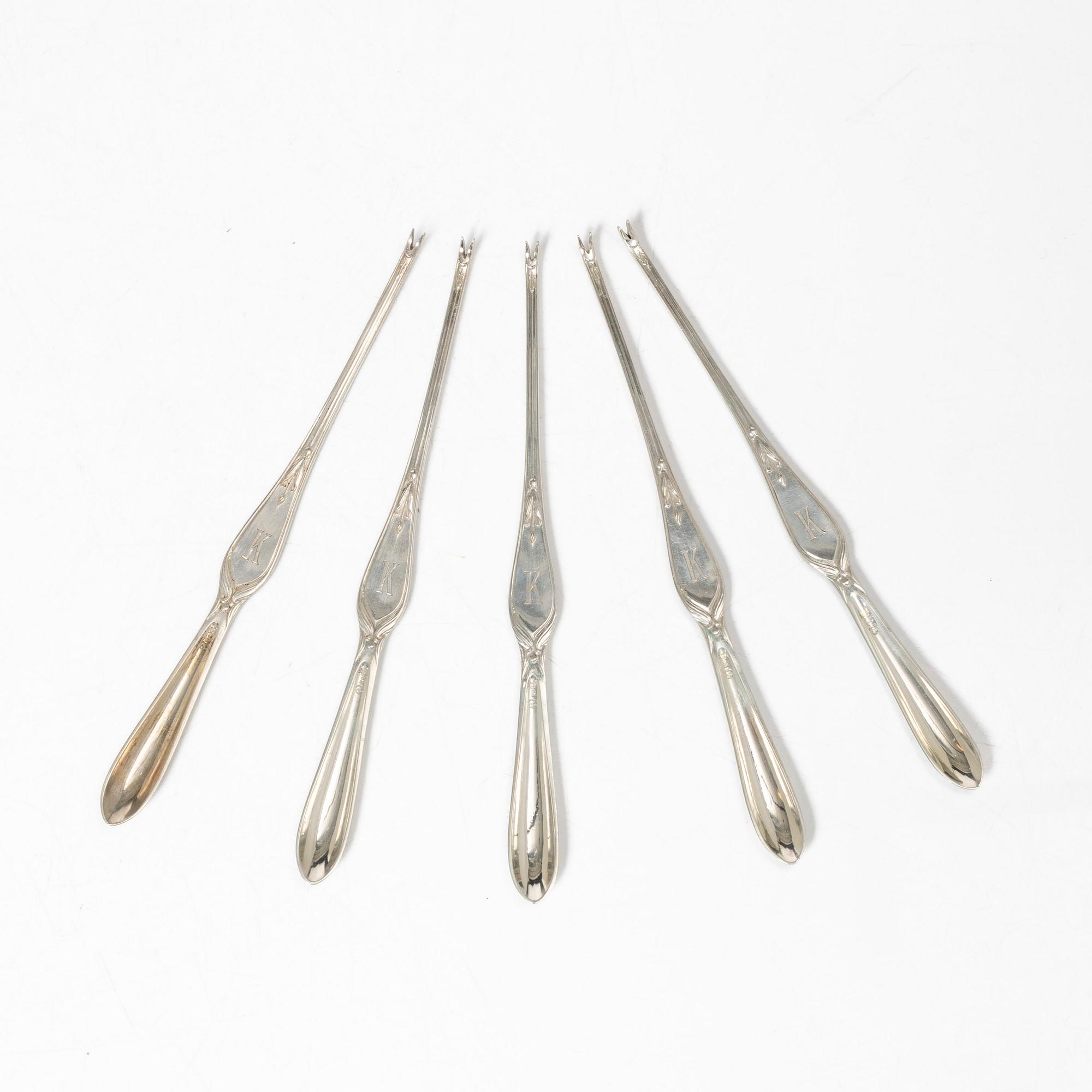 Hummergafflar, 5 st, samt smörhundar, 10 st, silver, 1900-talets mitt.