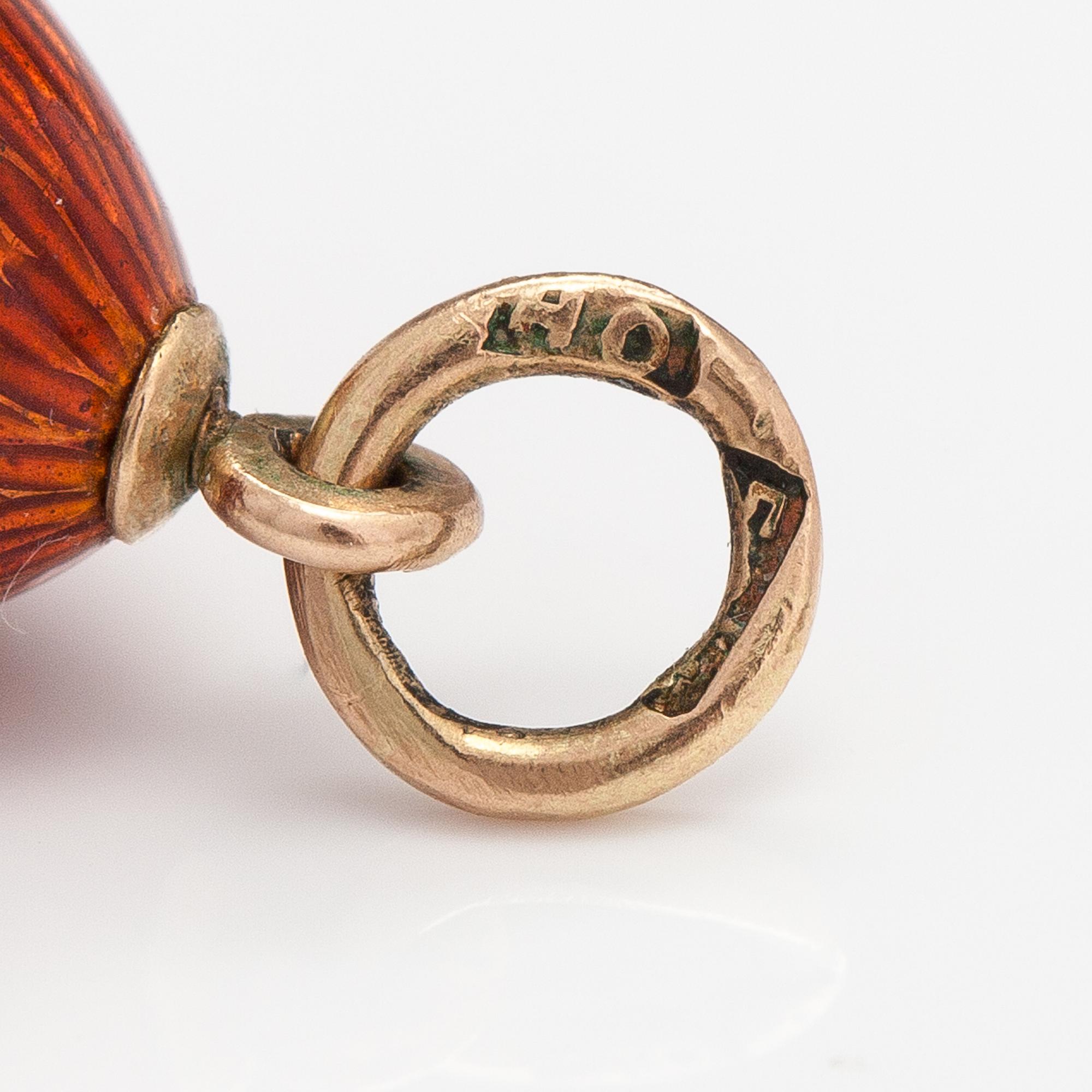 A 14K gold pendant with enamel. St. Petersburg, early 20th century.
