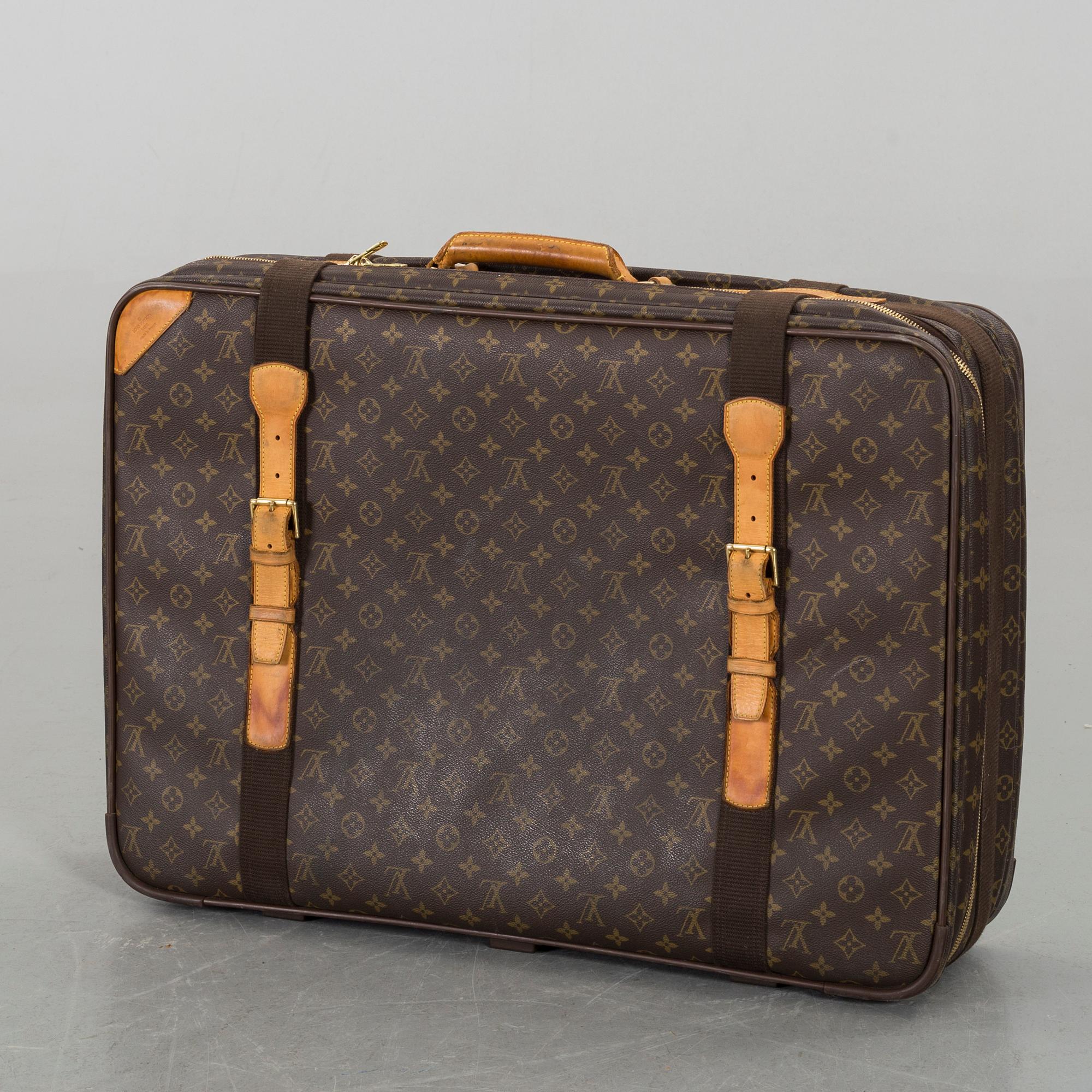 A LOUIS VUITTON  "Satellite 70" SUITCASE.