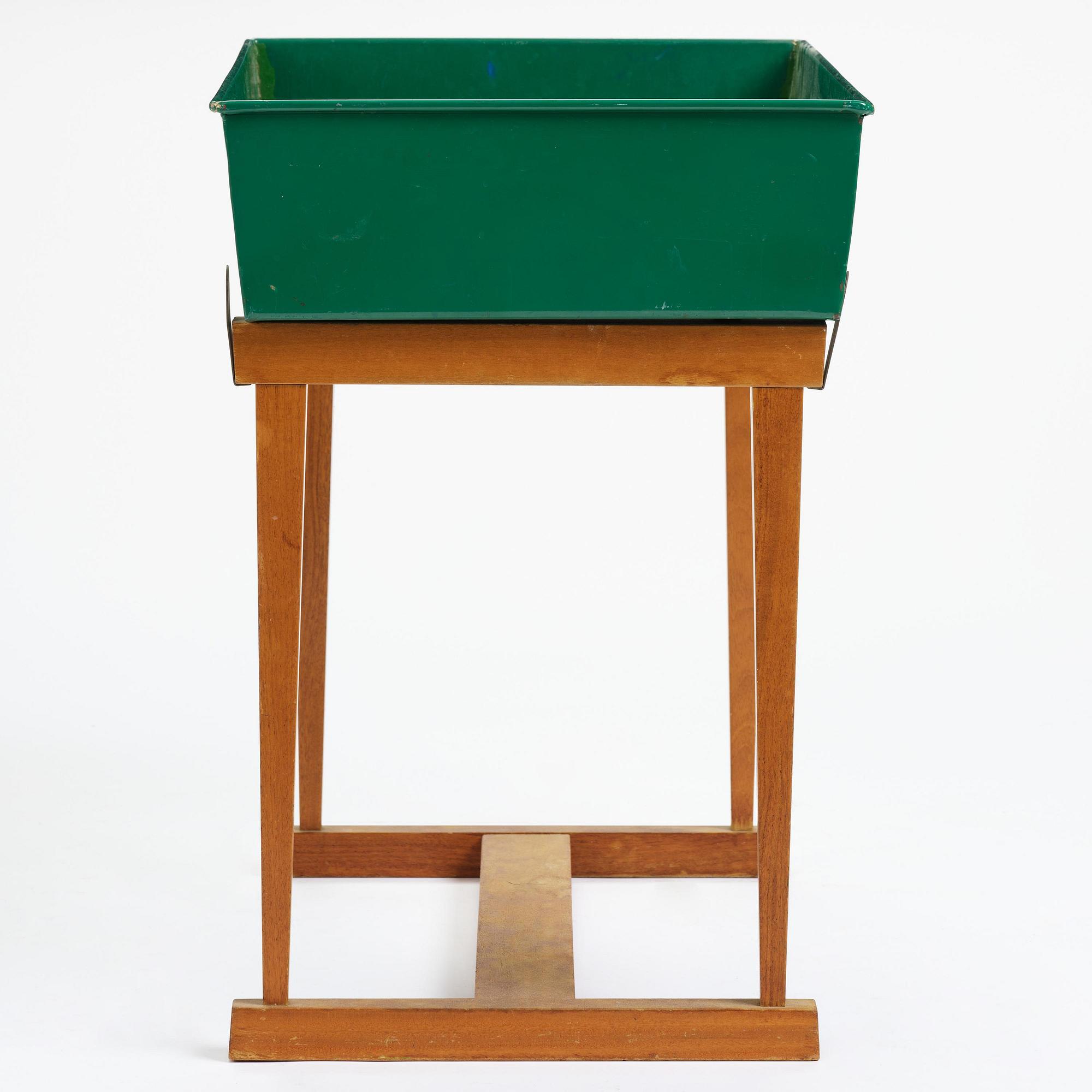 Josef Frank, a rare flower table with green lacquered box model "B 2084", Firma Svenskt Tenn, Sweden, 1950-60s.
