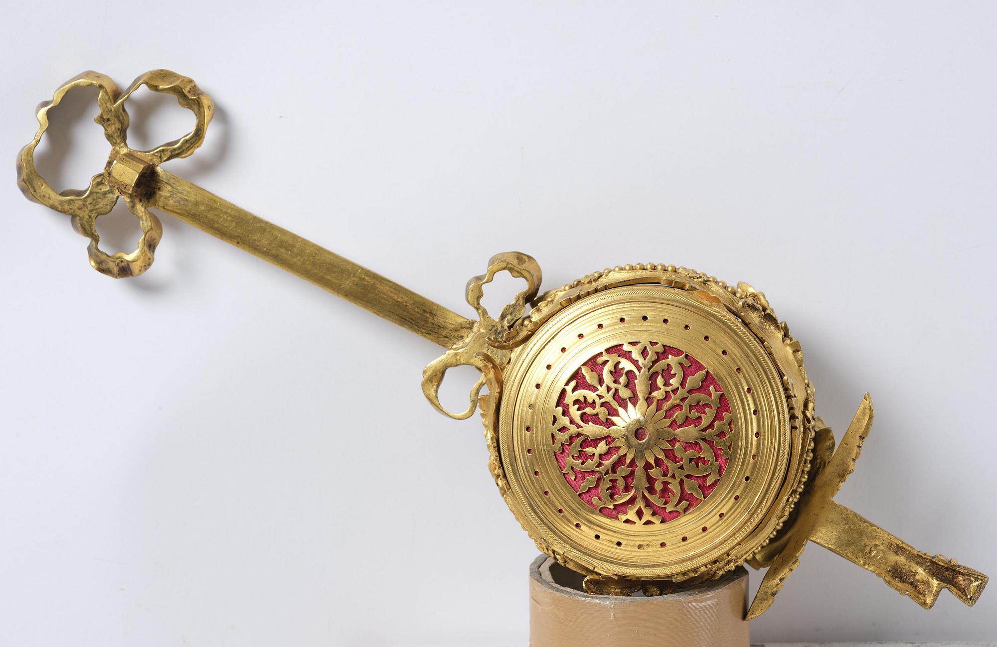 A French Louis XVI-style gilt-bronze cartel clock, 19th century.