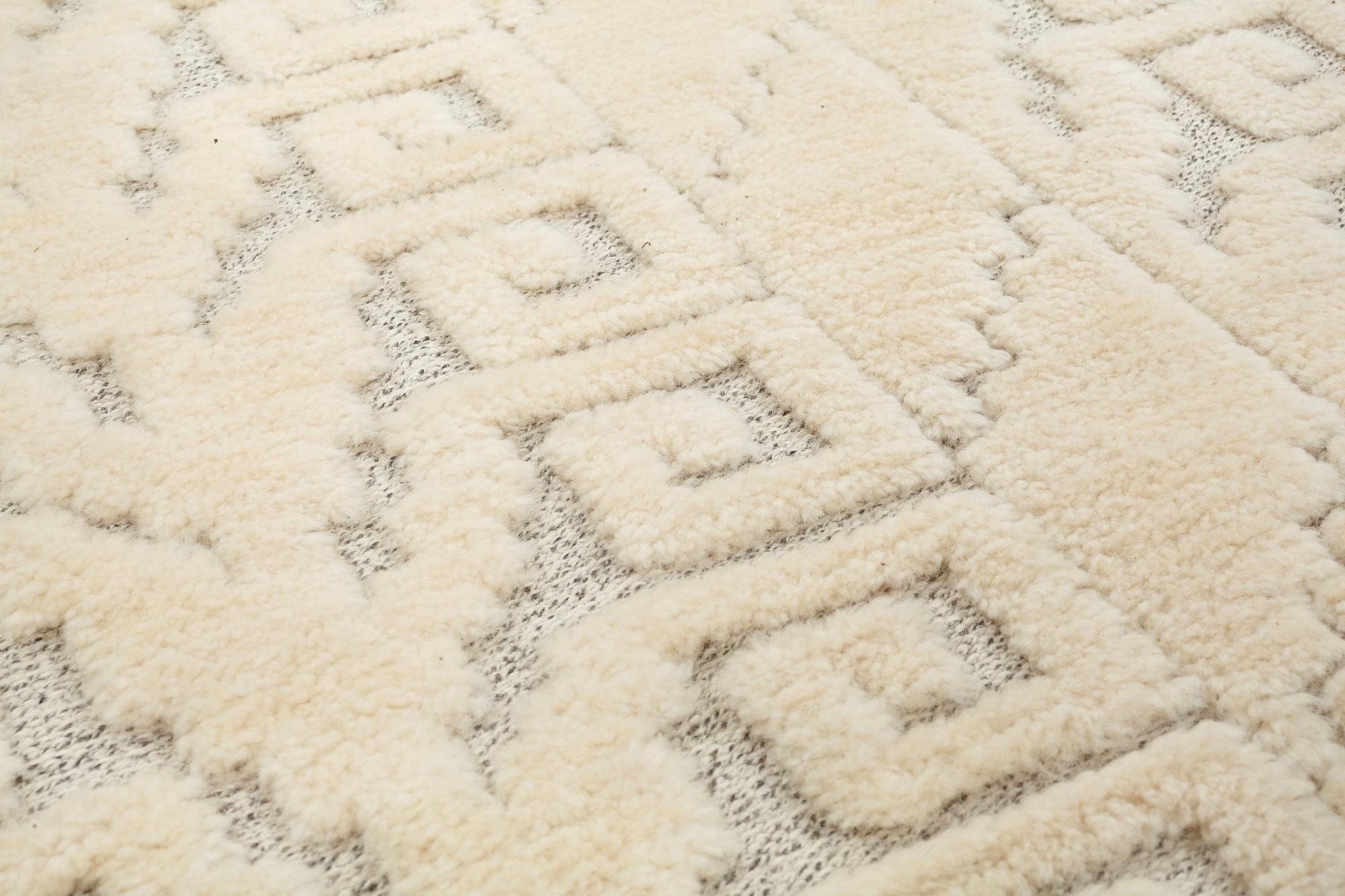 Märta Måås-Fjetterström, A CARPET, "Vita spetsporten", knotted pile in relief, ca 242,5 x 168,5 cm, signed AB MMF.