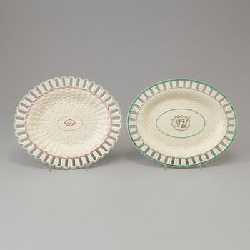 A CREAMWARE BASKET, PLATE AND A SIMILAR PLATE, one marked Wedgwood, first half of the 19th century.