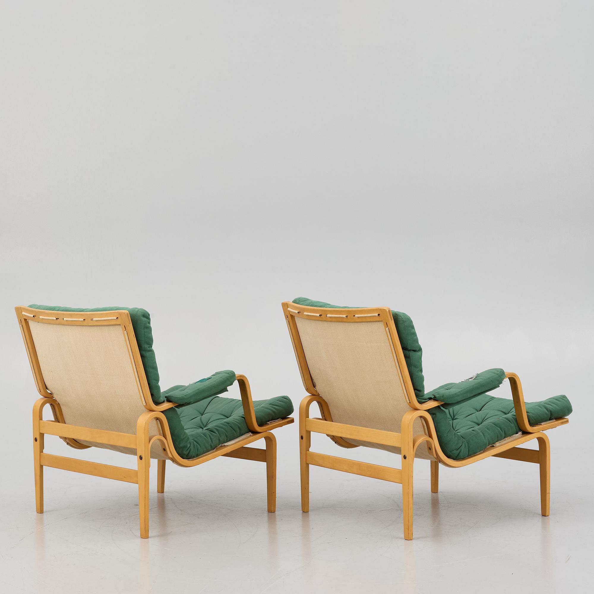 Bruno Mathsson, a pair of "Ingrid" armchairs, Dux, Sweden, second half of the 20th century.