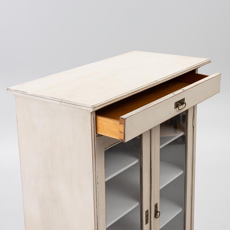 Display cabinet, early 20th century.