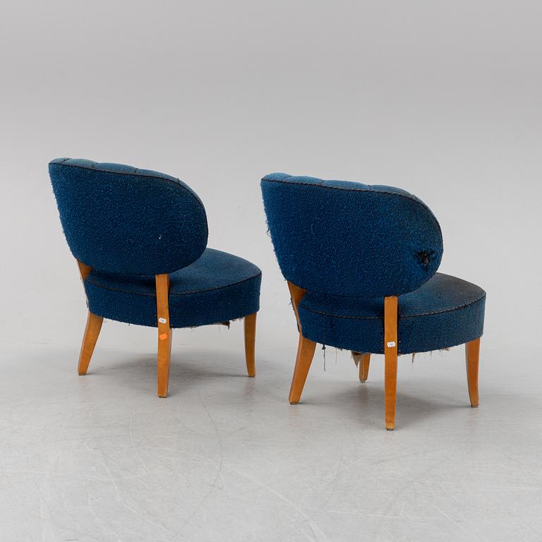 A pair of Carl Malmsten 'Gamla Berlin' easy chairs.