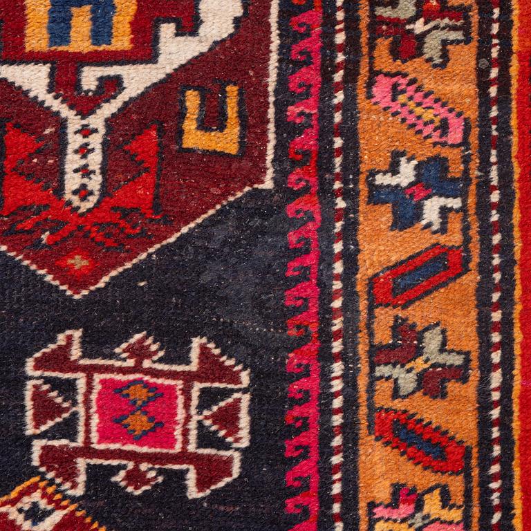 A semi-antique Anatolian runner, c. 409 x 159 cm.