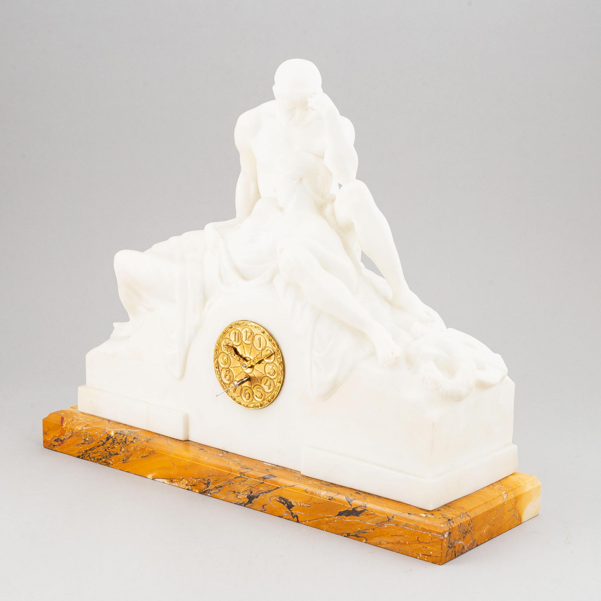 An alabaster mantle clock from the second half of the 19th-century.