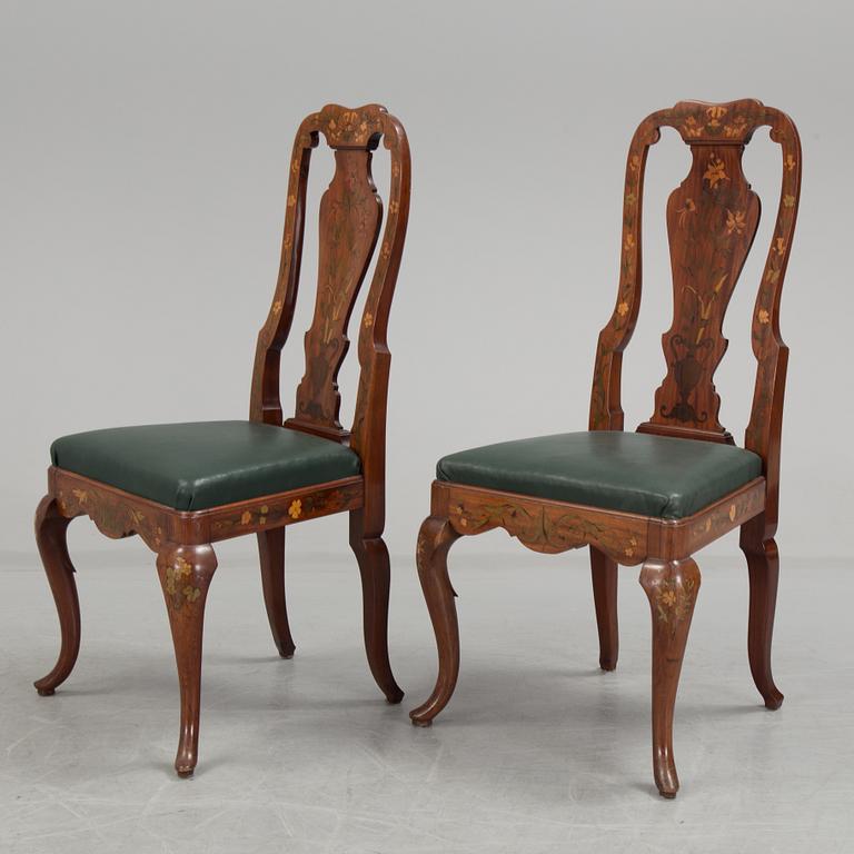 A pair of dutch rococo style chairs, first half of the 29th century.