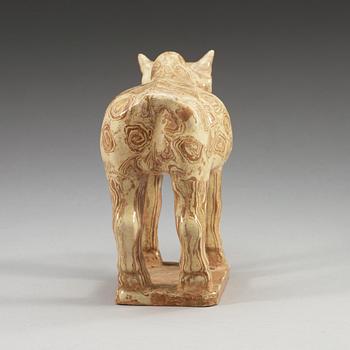 A glazed pottery figure of an ox, Tang dynasty (618-907).