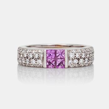 A princess-cut pink sapphire and 0.69ct brilliant-cut diamond ring.