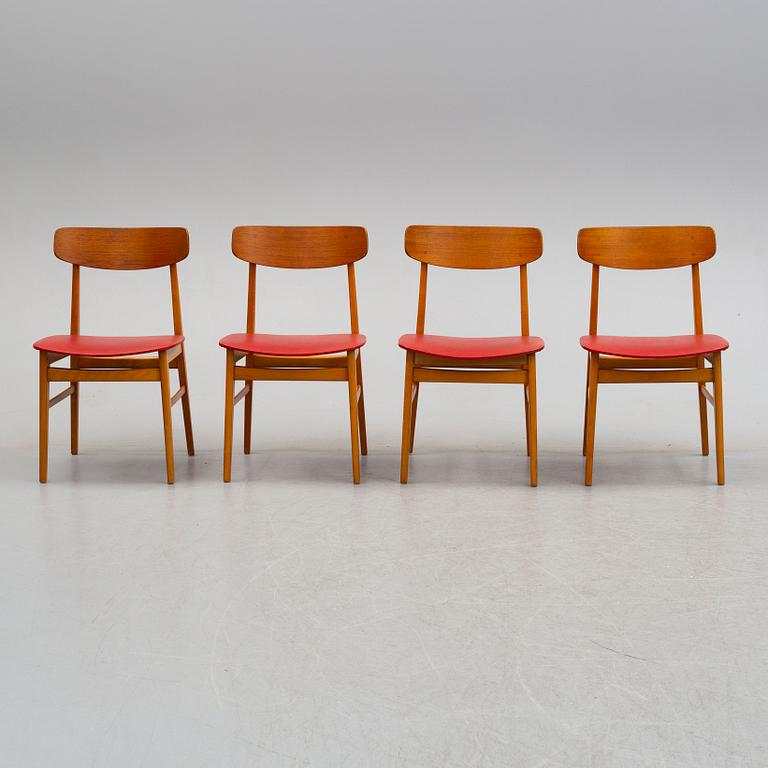 A set of four mid 20th century chairs.