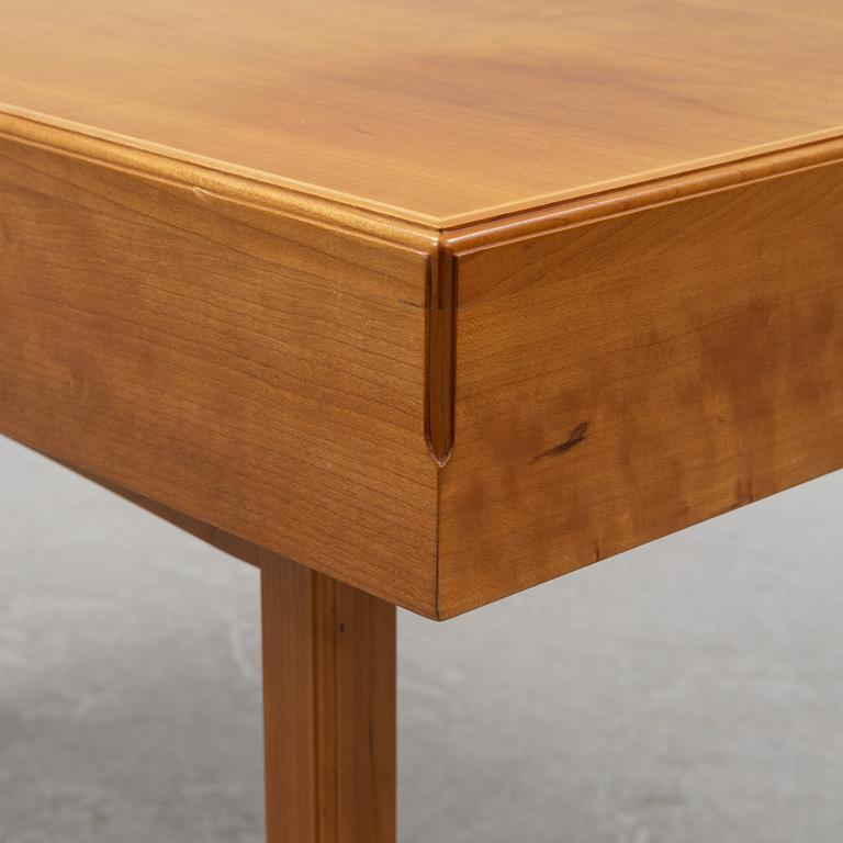 Josef Frank, a model '1022' cherry wood desk, Svenskt Tenn, post 1985.