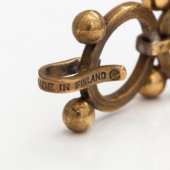 Kai Lindström, A bronze bracelet, model 1517. Kalevala Koru, Helsinki.