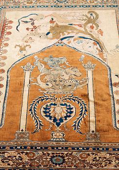 A RUG. An antique silk Heriz. 177 x 146 cm.