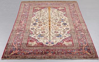 MATTO, a semi-antique silk Kashan,  ca 205 x 131,5 cm.